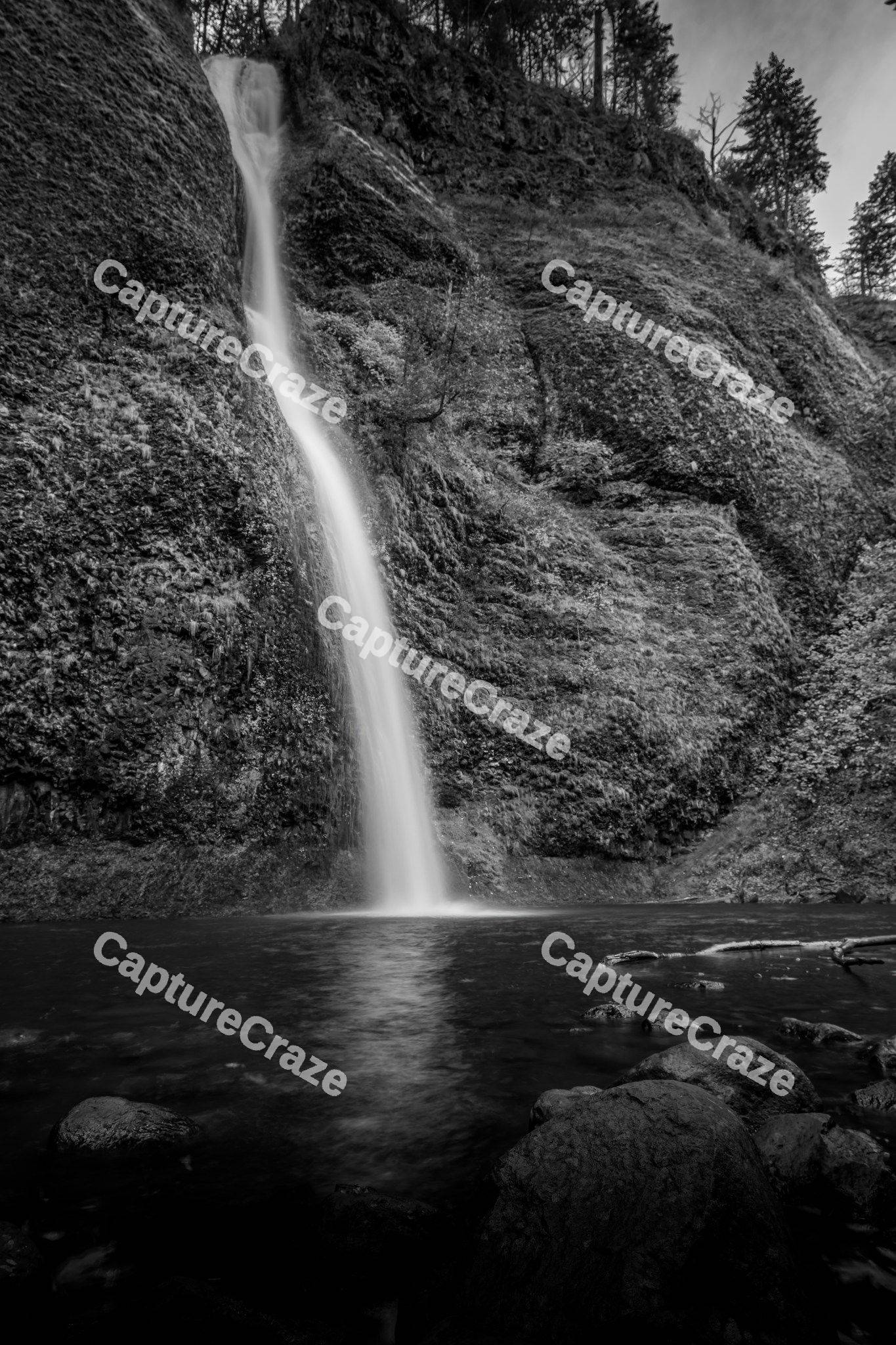 Waterfall streaming into the river